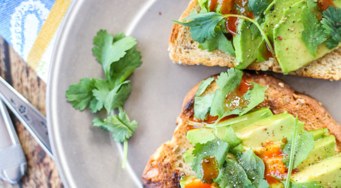 hot sauce on cilantro avocado toast