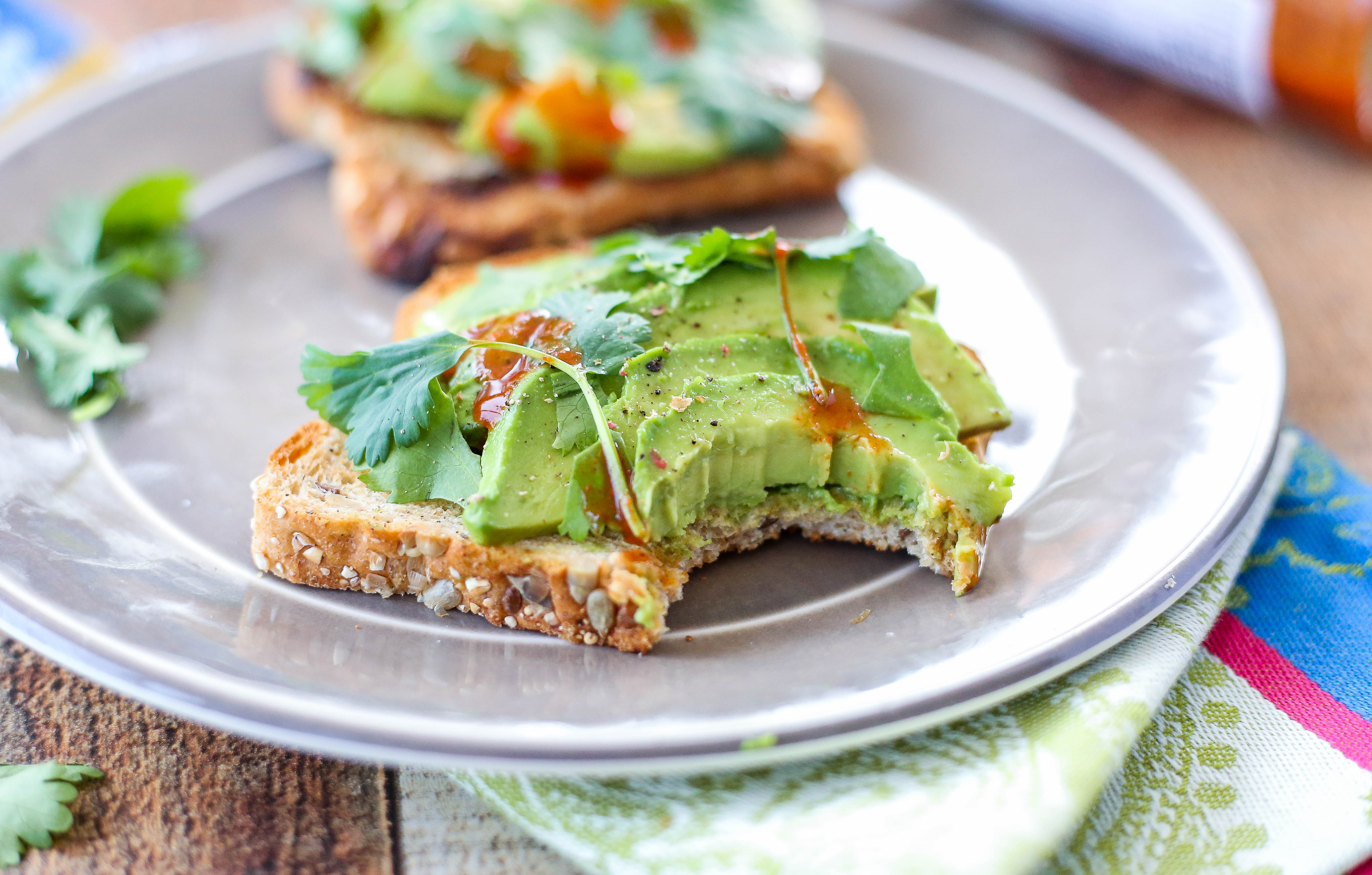 hot sauce on cilantro avocado toast